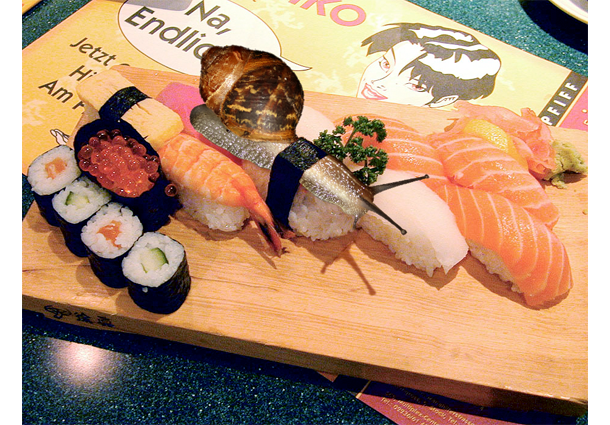 Snail photo-montaged into sushi picture