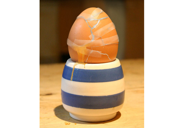 Taped up egg to repair it.